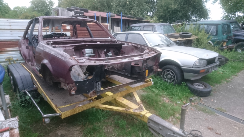 The V6, parted out, and my old GTD, waiting patiently for a make-over (there are currently 7 505s on my parents property)